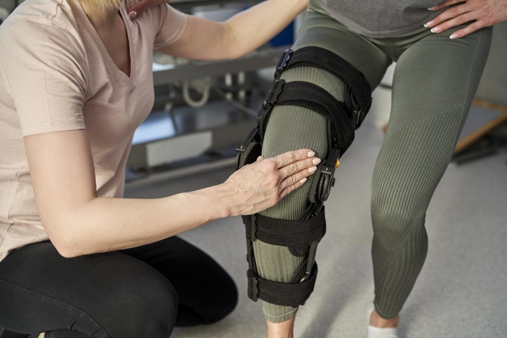 Physical Therapist with patient